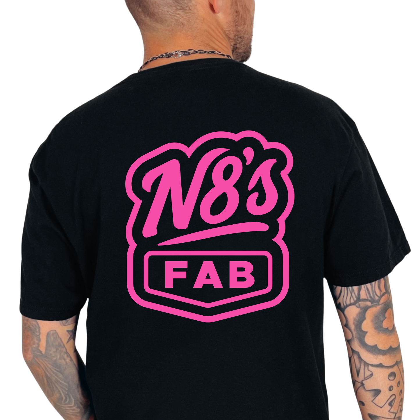 Black t-shirt with pink 'N8's FAB' logo on the back, worn by a person.