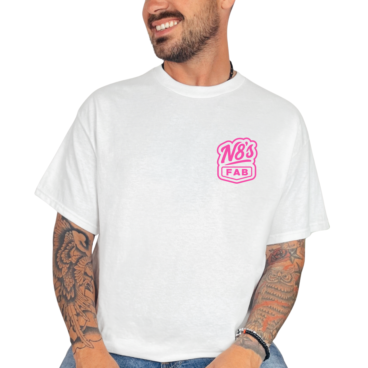 Man wearing a white t-shirt with a pink logo on a white background
